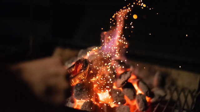 Fire bright lights rocks person free wallpaper - medium preview image