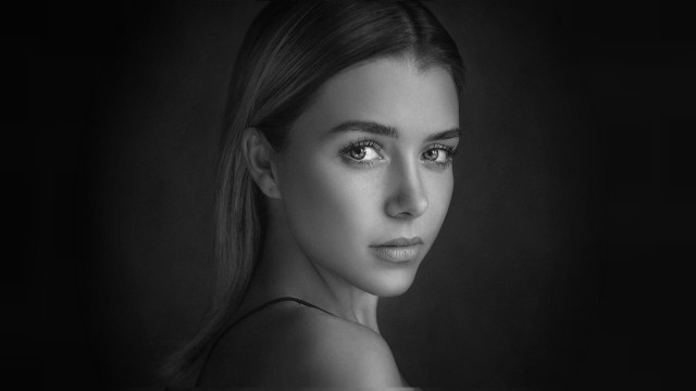Woman ponytail blackbackground photorealistic grayscale free wallpaper - medium preview image