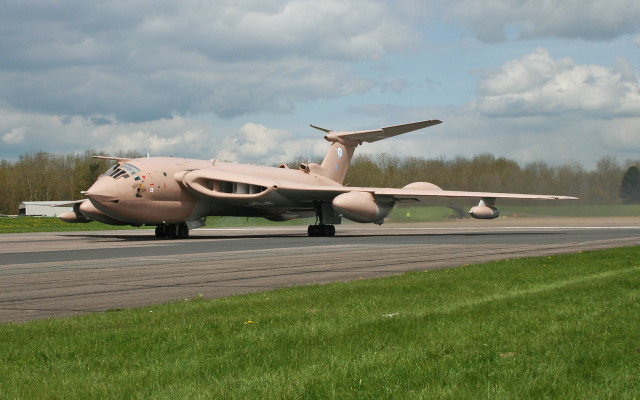 Military plane runway cloudy sky free wallpaper - medium preview image