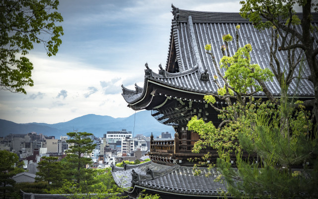 Building tree mountains cloudy sky free wallpaper - medium preview image
