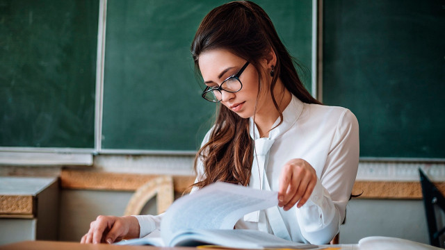 Woman glasses reading classroom chalkboard free wallpaper - medium preview image
