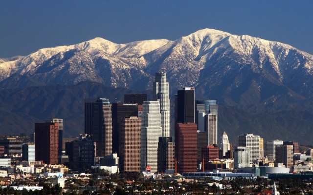 City tall buildings snowy mountain free wallpaper - medium preview image
