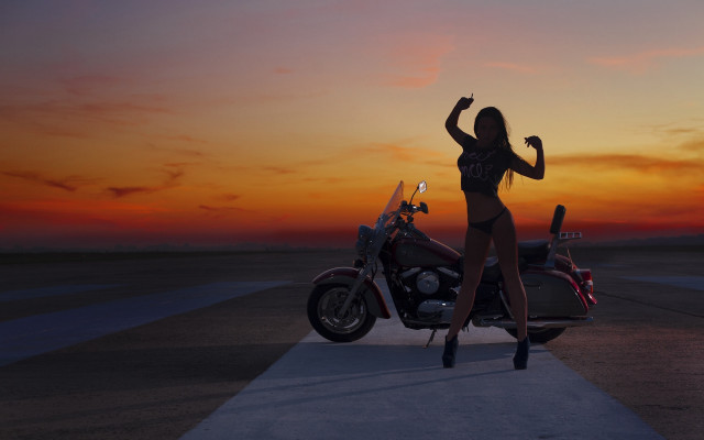 Woman motorcycle sunset beach figuration free wallpaper - medium preview image