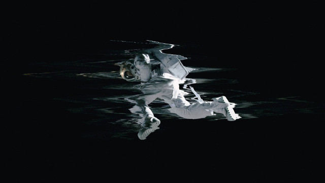 White statue floating water night free wallpaper - medium preview image