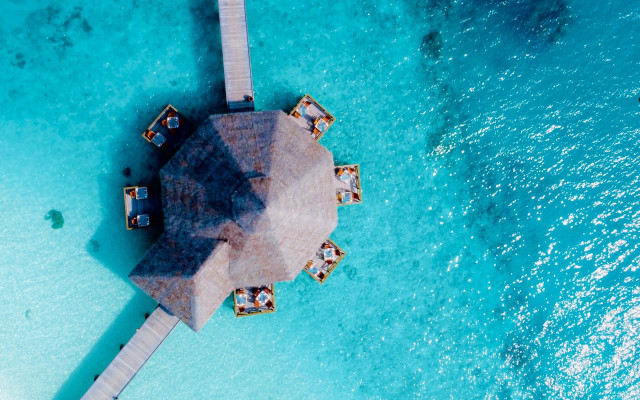 Small hut pier ocean astronaut free wallpaper - medium preview image