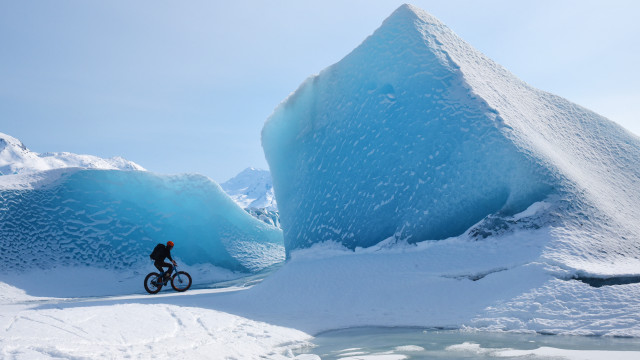 Iceberg biker snowy landscape blue free wallpaper - medium preview image