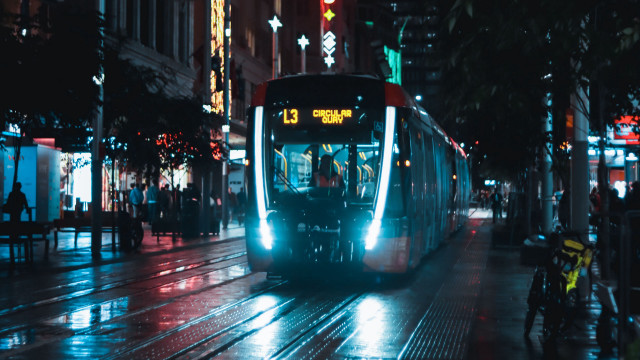 Futuristic cyberpunk bus night cityscape free wallpaper - medium preview image