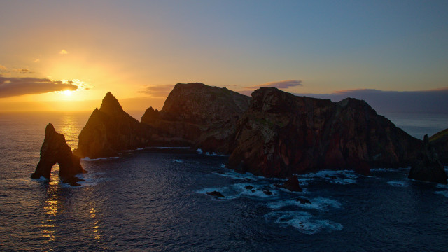 Sunset ocean rock formation water free wallpaper - medium preview image