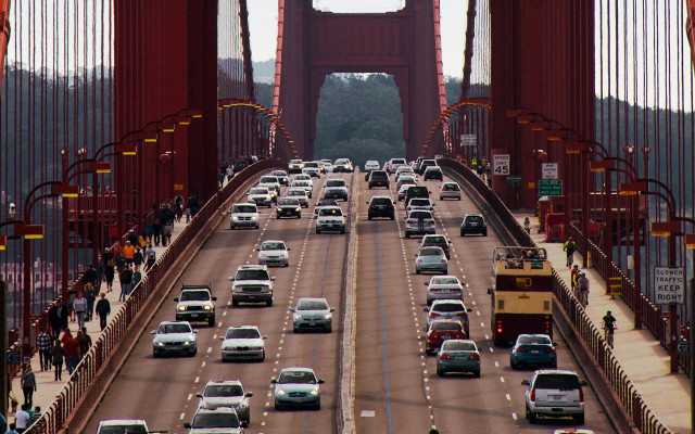Large bridge traffic tower cityscape free wallpaper - medium preview image