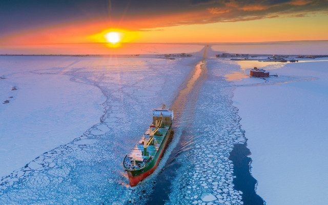 Frozen lake boat sunset mountains free wallpaper - medium preview image
