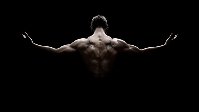 Man outstretched back muscular cross free wallpaper - medium preview image