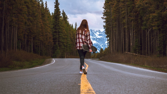 Woman skateboard mountain outdoors cinematic free wallpaper - medium preview image