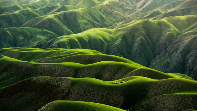 Green mountain range plane window #2 free wallpaper - medium preview image