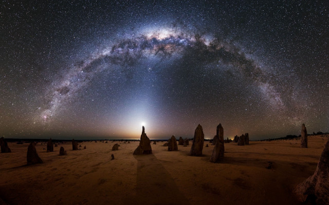 Night sky starfilled rocks astronaut free wallpaper - medium preview image