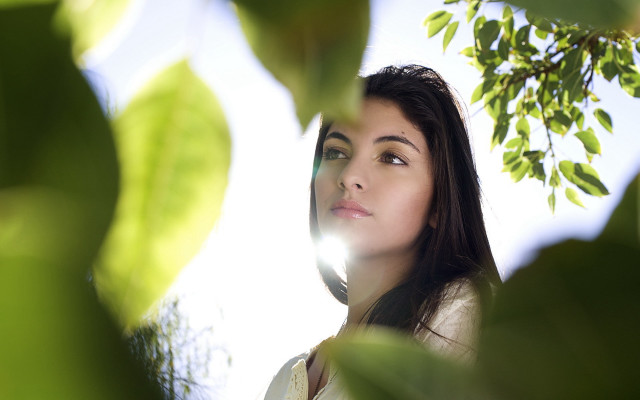 Woman headset sky tree bokeh free wallpaper - medium preview image