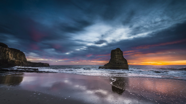 Beach rock formation sunset clouds free wallpaper - medium preview image