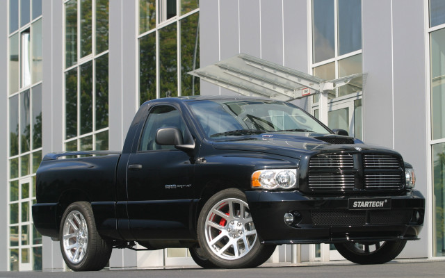Black truck building large window free wallpaper - medium preview image