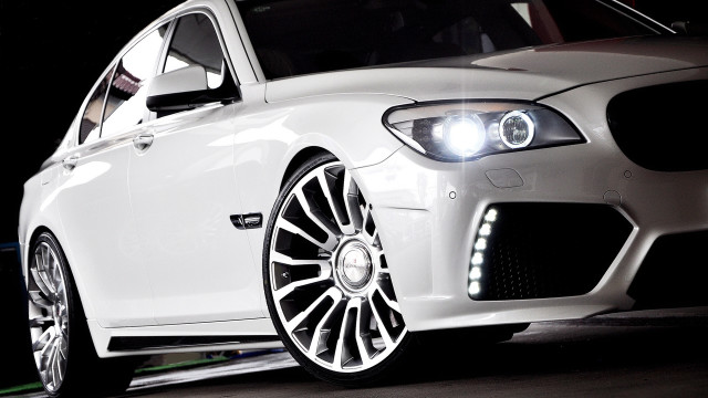 White car bright headlight garage free wallpaper - medium preview image