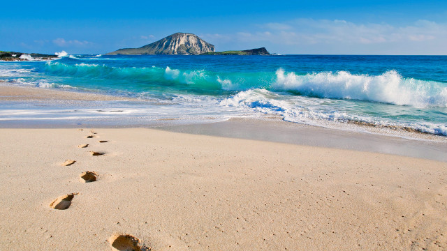 Beach wave footprints island sky free wallpaper - medium preview image