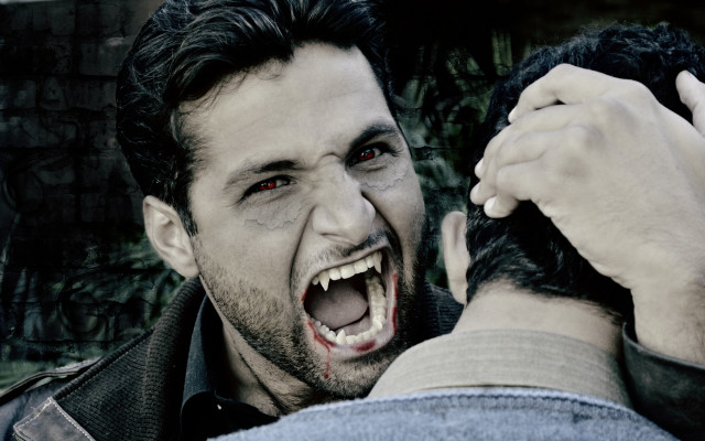 Man shocked holding head blood free wallpaper - medium preview image