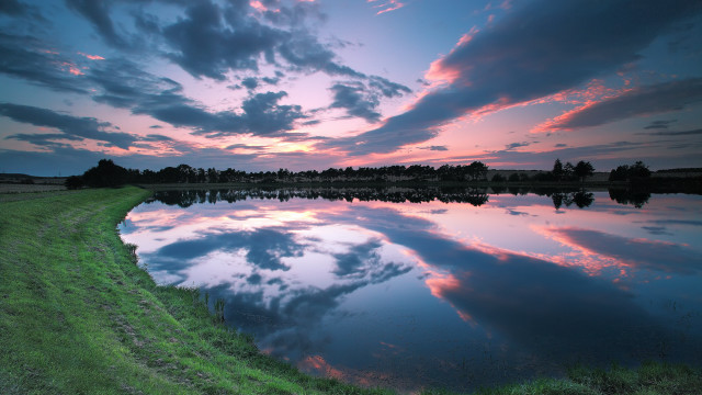 Lake grassy bank cloudy sky free wallpaper for desktop - medium preview image