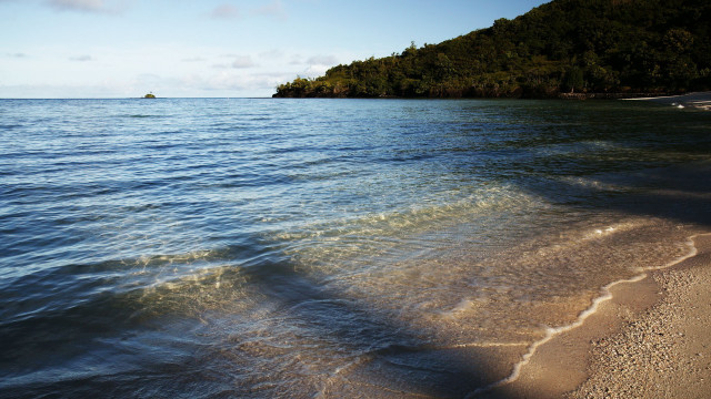 Beach island boat sky mountain free wallpaper - medium preview image