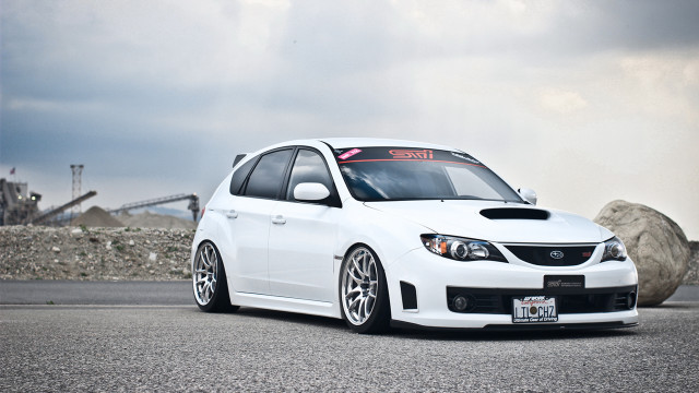 White car rock pile pearlescent free wallpaper - medium preview image