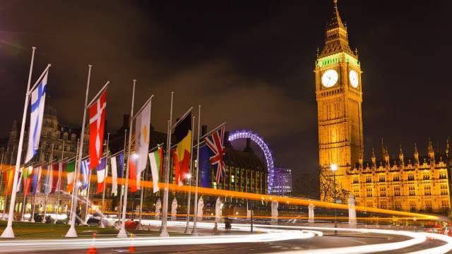 Clock tower cityscape ferriswheel night free wallpaper - medium preview image