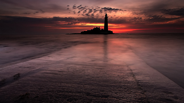 Lighthouse island sunset clouds ocean free wallpaper - medium preview image