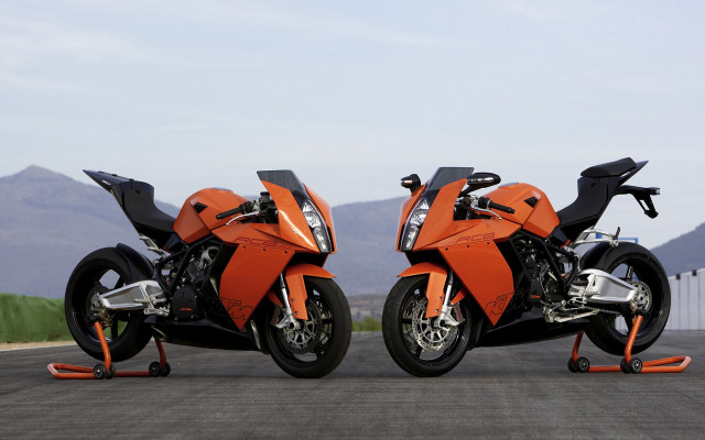 Orange motorcycles mountains symmetry digital free wallpaper - medium preview image