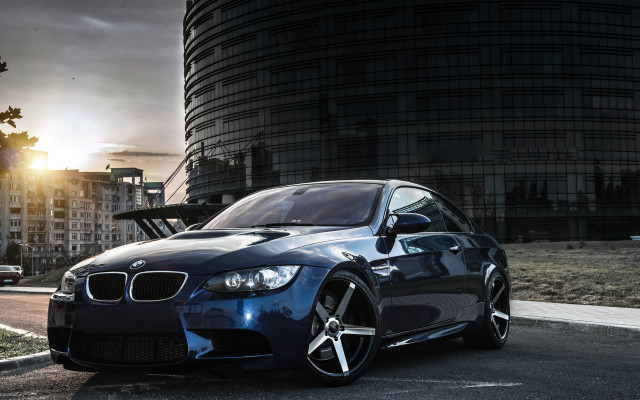 Blue car tall building sunset #2 free wallpaper - medium preview image