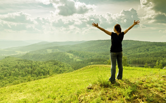 Woman hands outstretched hill mountains free wallpaper - medium preview image
