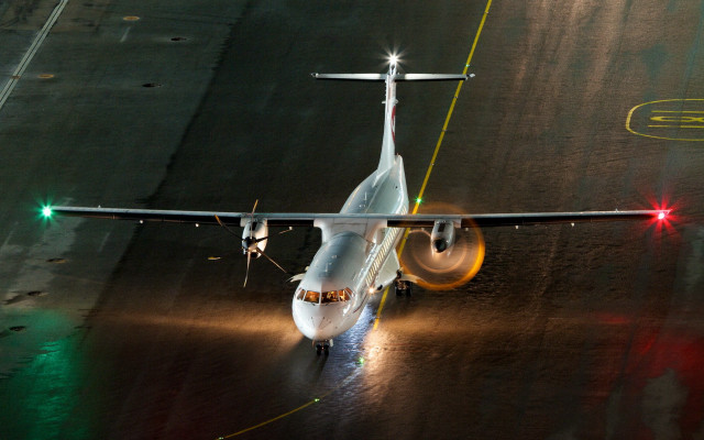 Jetliner foggy night lighting tiltshift free wallpaper - medium preview image