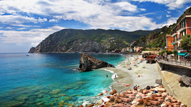 Beach cliff water boat mountain #2 free wallpaper - medium preview image