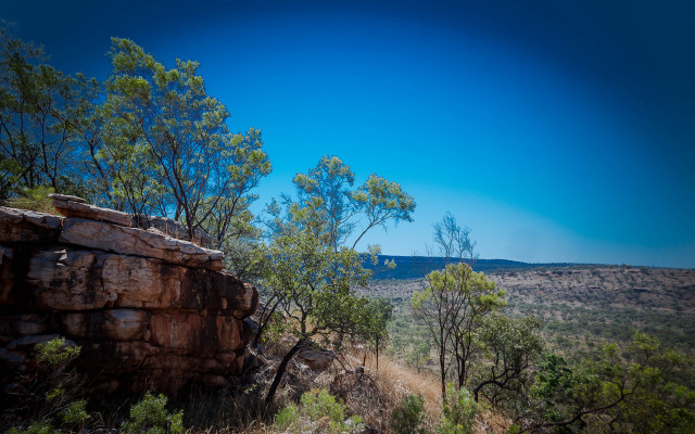 Rocky cliff trees autumn blue free wallpaper - medium preview image