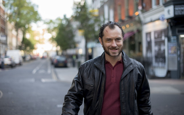 Man smiling leather jacket city free wallpaper - medium preview image