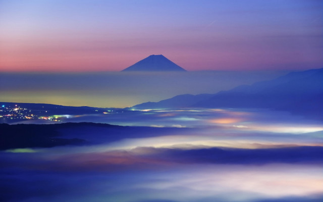 Mystical mountain city foggy night free wallpaper - medium preview image