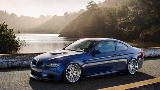 Blue car lake trees sun free wallpaper - medium preview image