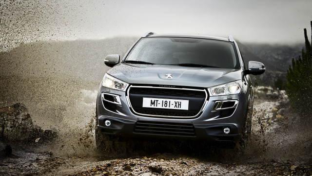 Grey truck muddy road cactus free wallpaper - medium preview image