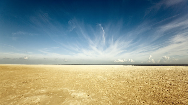 Beach blue sky clouds footprints free wallpaper - medium preview image