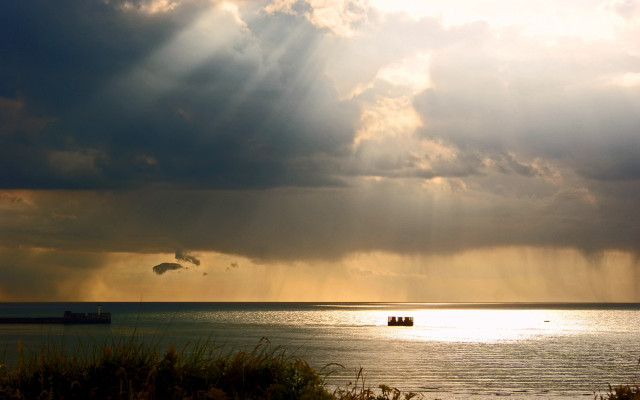 Boat sunset godrays mountain ocean free wallpaper - medium preview image
