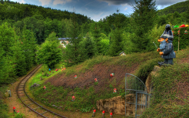 Statue man traintrack forest ecological free wallpaper - medium preview image