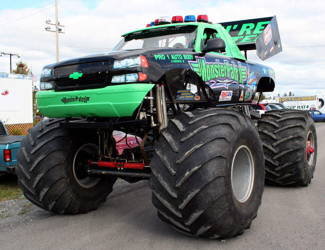 Monster truck large tire road free wallpaper - medium preview image