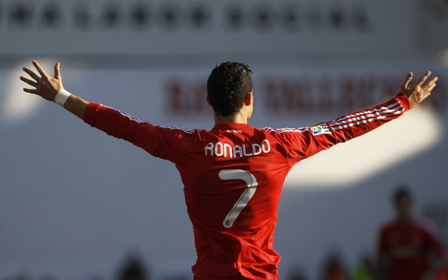 Man red shirt soccer outstretched free wallpaper - medium preview image