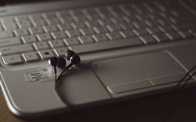 Headphones laptop mouse desk tiltshift free wallpaper - medium preview image