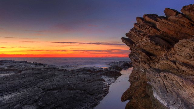 Rocky cliff sunset cloudy sky free wallpaper - medium preview image