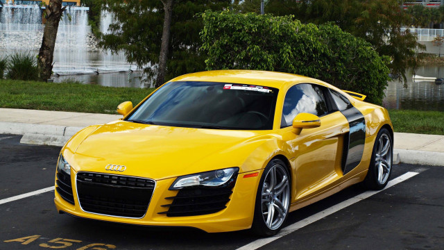 Yellow sports car parking lot #40 free wallpaper - medium preview image