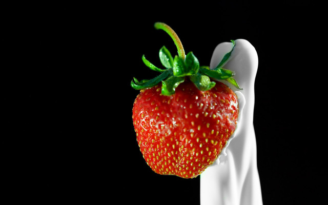Strawberry held white hand massurrealism free wallpaper - medium preview image
