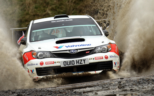 White car muddy road forest free wallpaper - medium preview image