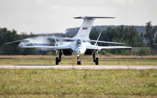 Jet plane smoke runway jigsaw free wallpaper - medium preview image